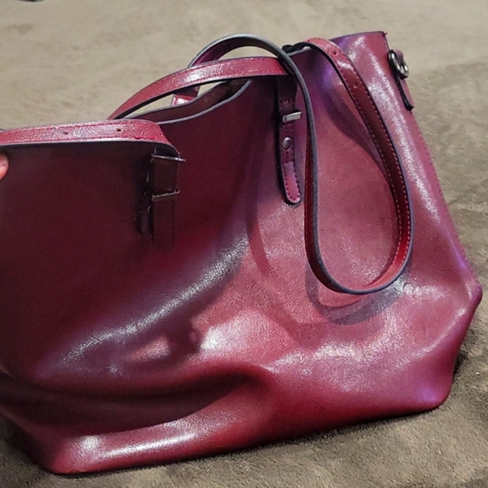 JCPENNEY Blood red leather handbag with strap adjustments